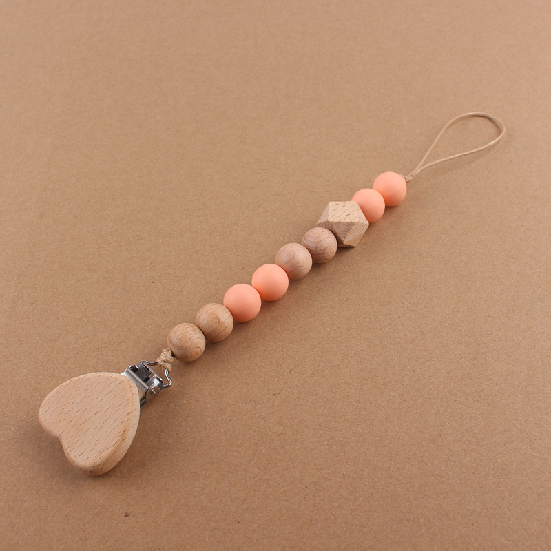 Nuevos suministros para bebés de dibujos animados amor haya chupete clip creativo bebé cuentas de silicona mordedura molar chupete cadena