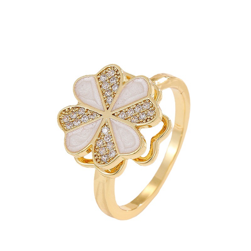 18K oro real color-preservar la suerte de la hierba estilo coreano transfronterizo diamante incrustado rotación de moda abierto anillo ajustable