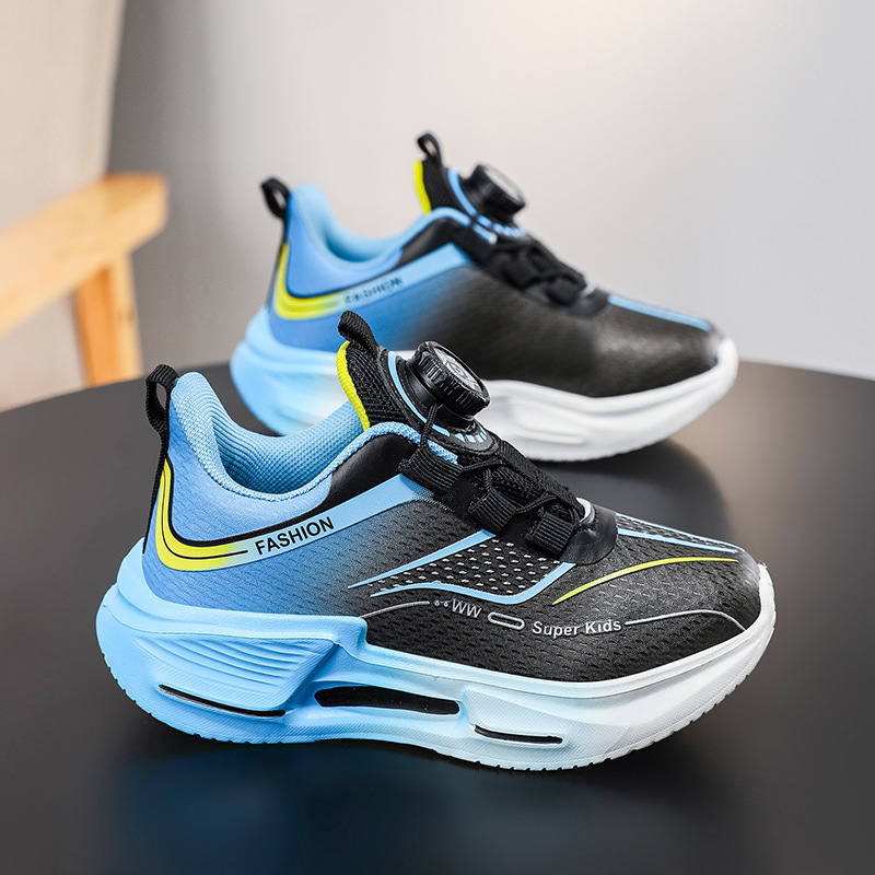 Fábrica directa de botón giratorio para niños zapatos de carrera primavera y otoño antideslizante para niños y niñas zapatos deportivos transpirables ligeros al aire libre cómodos