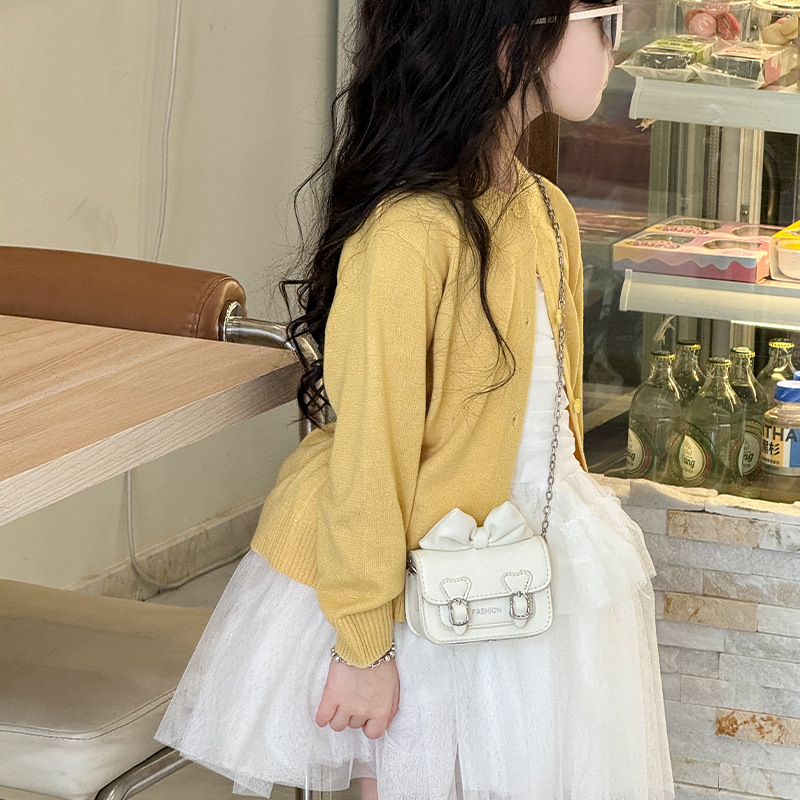 Versión coreana del bolso de hombro para niña con fragancia pequeña, bolso de mensajero para bebé con lazo lindo, bolso para niños con mini cadena de color sólido