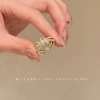 Knotted Pearl Ring Opening
