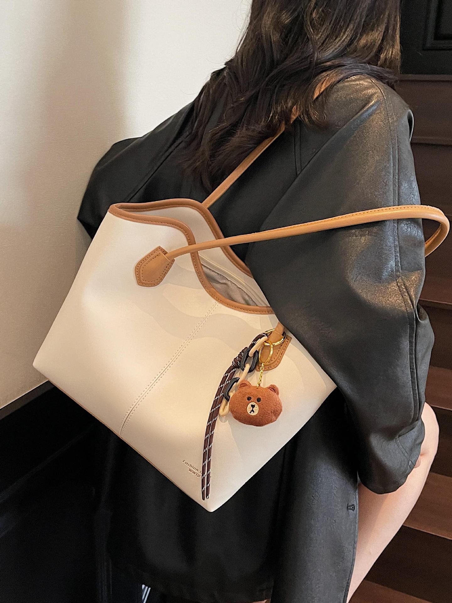 Cross-border retro simple bolso de mano para mujeres 2025 nuevo viaje al trabajo bolso de hombro de gran capacidad bolso de moda debajo de la axila