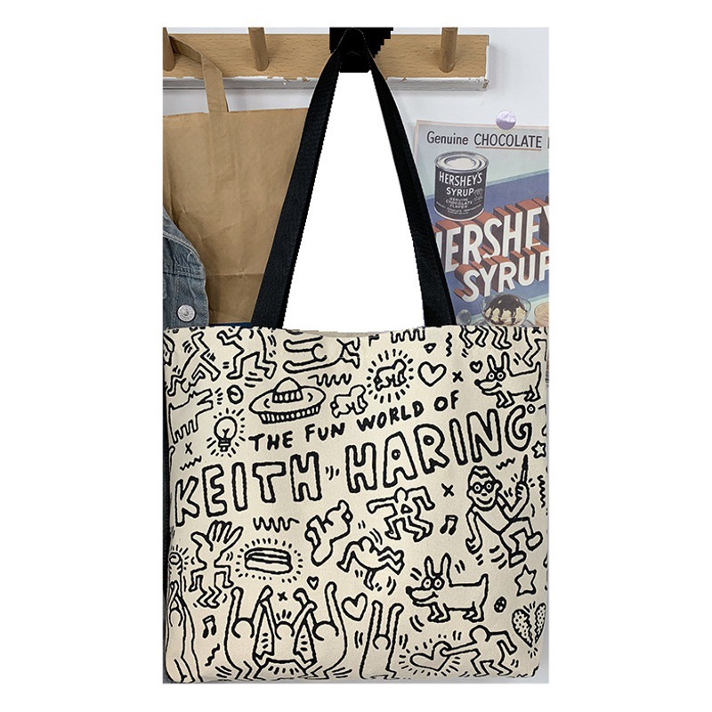 Estilo coreano nueva bolsa de lona mujer estudiante universitario clase un hombro portátil libro bolsa de gran capacidad nicho lindo bolsa de tela