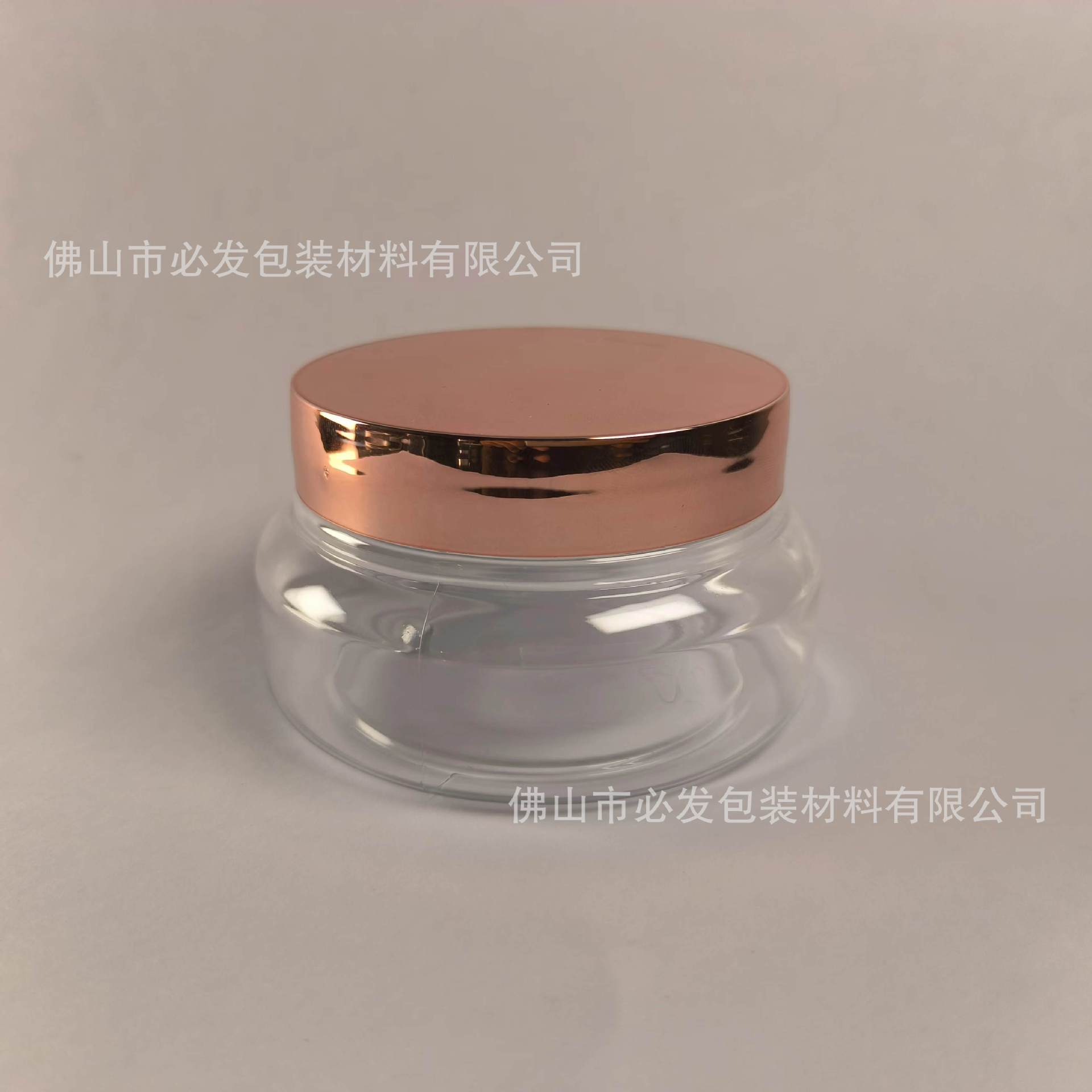 150g; Botella transparente de 150g + tapa chapada en oro rosa; PET