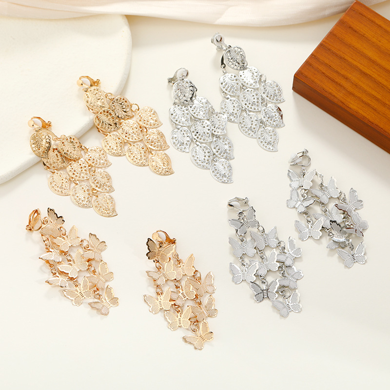 New earrings fashion long metal stitching butterfly leaf earrings