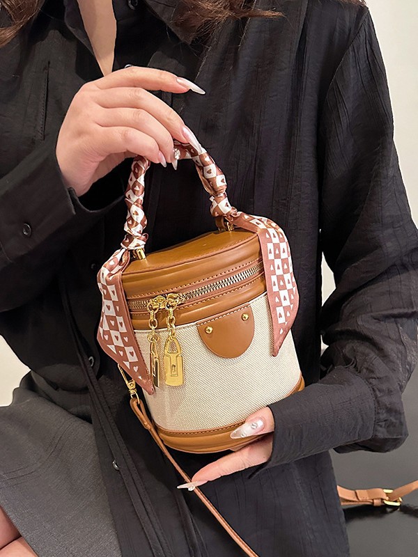 Bolso bolso bandolera femenino 2025 transfronterizo nuevo estilo coreano moda bolso de cubo portátil de alta calidad en contraste color bolso de hombro image 1