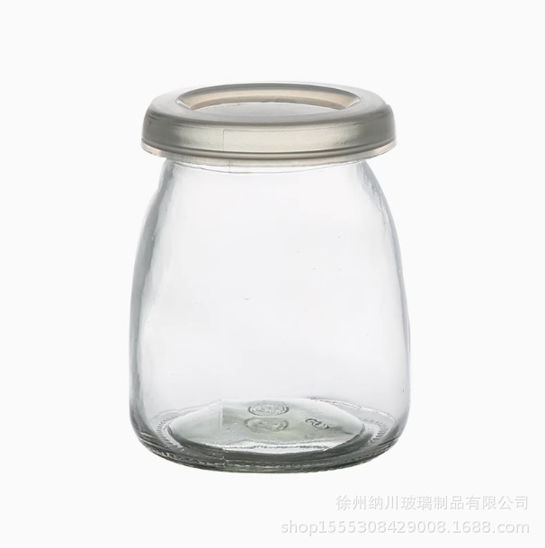 Botella de pudín de vidrio al por mayor de 100ml botella de leche gruesa botella de yogur resistente a altas temperaturas botella de vidrio tapón de madera botella de deseo botella