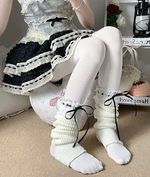 Hole white socks with black ribbon