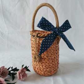 新款玉米皮小圆筒包 蕾丝蝴蝶单肩手提包 简约休闲草编包