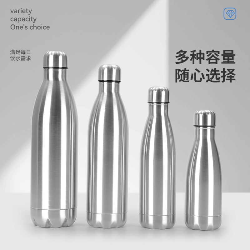 Botella de cocaque de acero inoxidable Amazon 304 con manija Taza de vacío de doble capa Botella deportiva de bala portátil