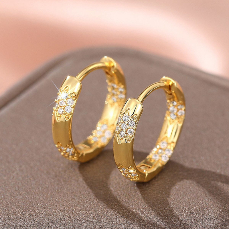 fashionable copper earrings with zircon