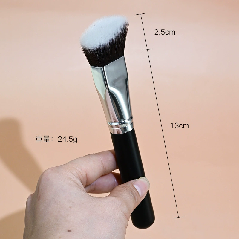 Black foundation, soft face blush for contouring, brush