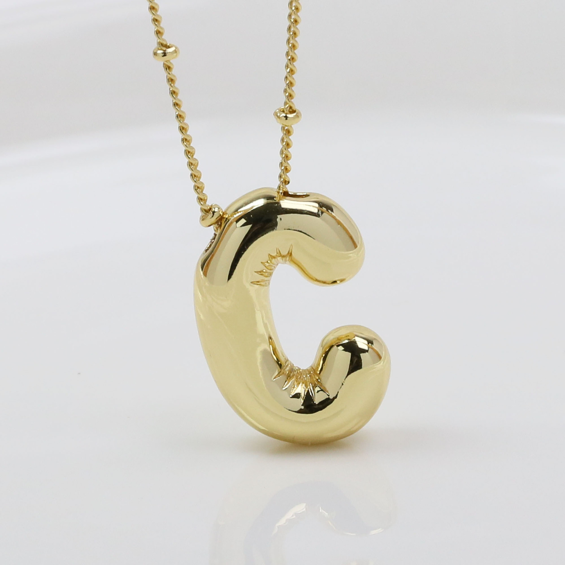 Amazon explosión 18k oro latón brillante globo de burbujas 26 letras inglesas colgante collar de moda