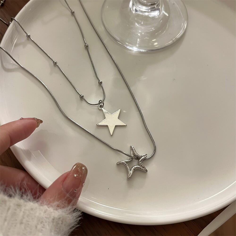 Casual Simple Style Pentagram Alloy Titanium Steel Plating Hollow Out Necklace display picture 1