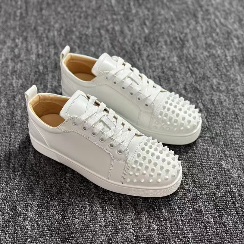 Europa y los Estados Unidos comercio exterior zapatos rojos remachos zapatos de hombre tacos de pareja zapatos casuales de moda zapatos casuales zapatos casuales