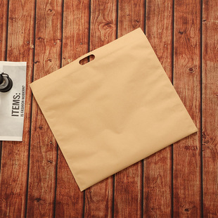 Hand-held kraft paper bag coated with inner film waterproof thickened express bag thickened self-sealing clothing children's clothing packaging bag