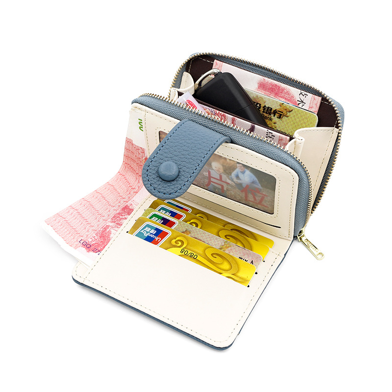 Nueva cartera transfronteriza de las mujeres simple patrón lychee cremallera monedero corto chica cartera al por mayor