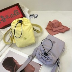 クロスボーダー卸売り2025春夏大容量防水韓国版熱売ひも携帯電話の女性カバン収納バッグ斜め掛け