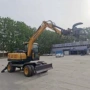 重工轮式废铁木头抓木机
