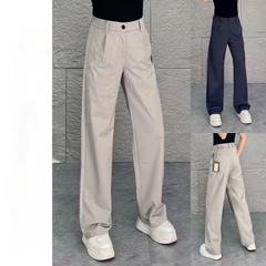 高品質のファッションの男性のモデルはファッションの純色のゆったりとしたごろつきのハンサムな空気のシンプルなストレートデザイン感のカジュアルなズボンを合わせます。