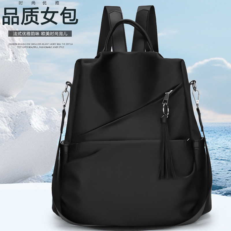 2023 nuevas damas casuales tela Oxford mochila antirrobo moda borla mochila de viaje multifuncional cabello