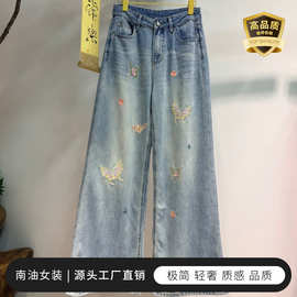棉高端水洗牛仔裤女 时尚蝴蝶绣花工艺精致口袋南油源头工厂直销