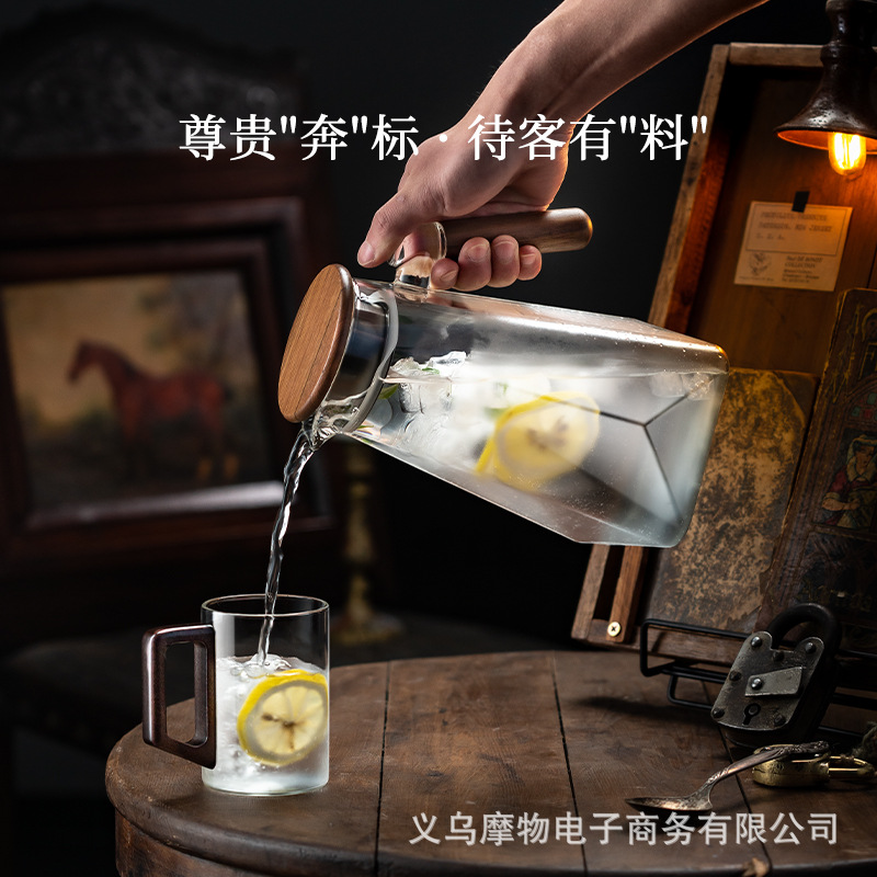 Juego de taza de agua de tetera de vidrio de alta gama de estilo chino, taza de té para la hospitalidad en el hogar, taza de bebida de alto valor con base de madera resistente a los trópicos