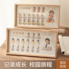 メーカーの子供のキャンパスの時間の成長の記録のフォトフレームは台の卸売りの証明書の写真を並べます。