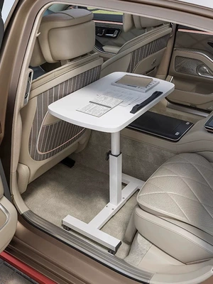 Suitable for use as a foldable car tray table for eating meals in the passenger seat, and for laptop and office computer use in the front and back seats