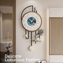 艺钟美新款创意家用时尚钟表挂钟客厅高级感卧室轻奢装饰静音壁钟