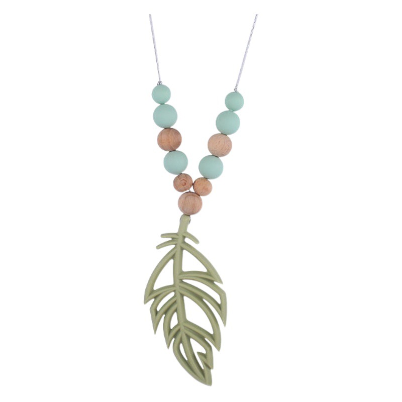 Nuevo bebé suministros silicona hoja mordedor collar fábrica directa pluma collar bebé calmante mordedor palo