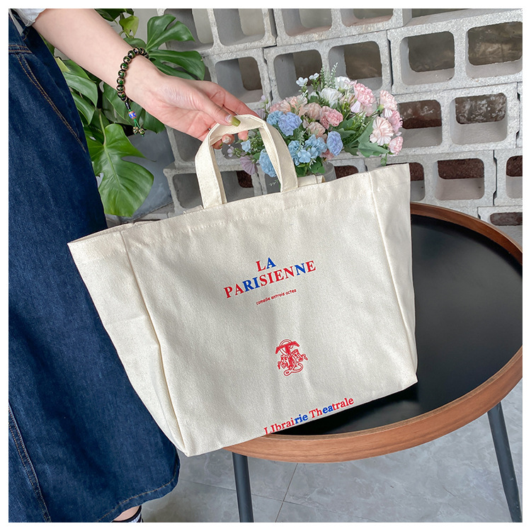 A large-capacity, sturdy Japanese-style canvas bag for women, a new 2022 simple bento handbag for girls to go to work undefined