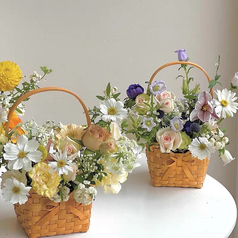 メーカーは手作りの蝶結びの花かごを提供しています。|undefined