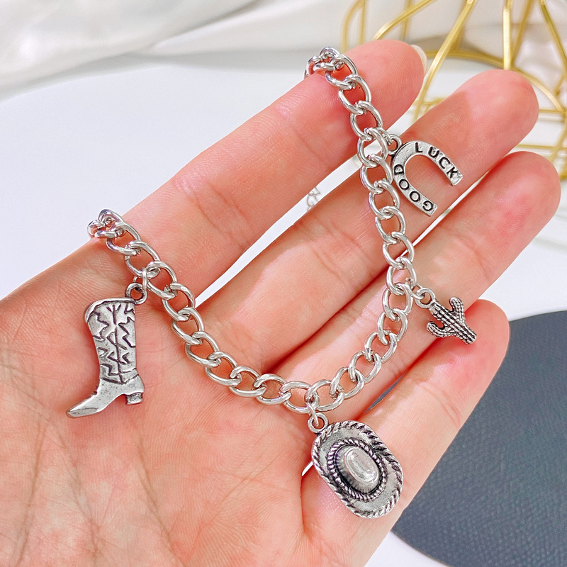 Punk hip-hop boots bracelet female European and American retro alloy do old western cowboy hat pendant bracelet wholesale
