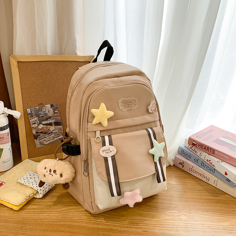 2025 nueva mochila de ocio del campus, mochila versátil de alto valor para estudiantes de primaria y secundaria, mochila de gran capacidad de moda