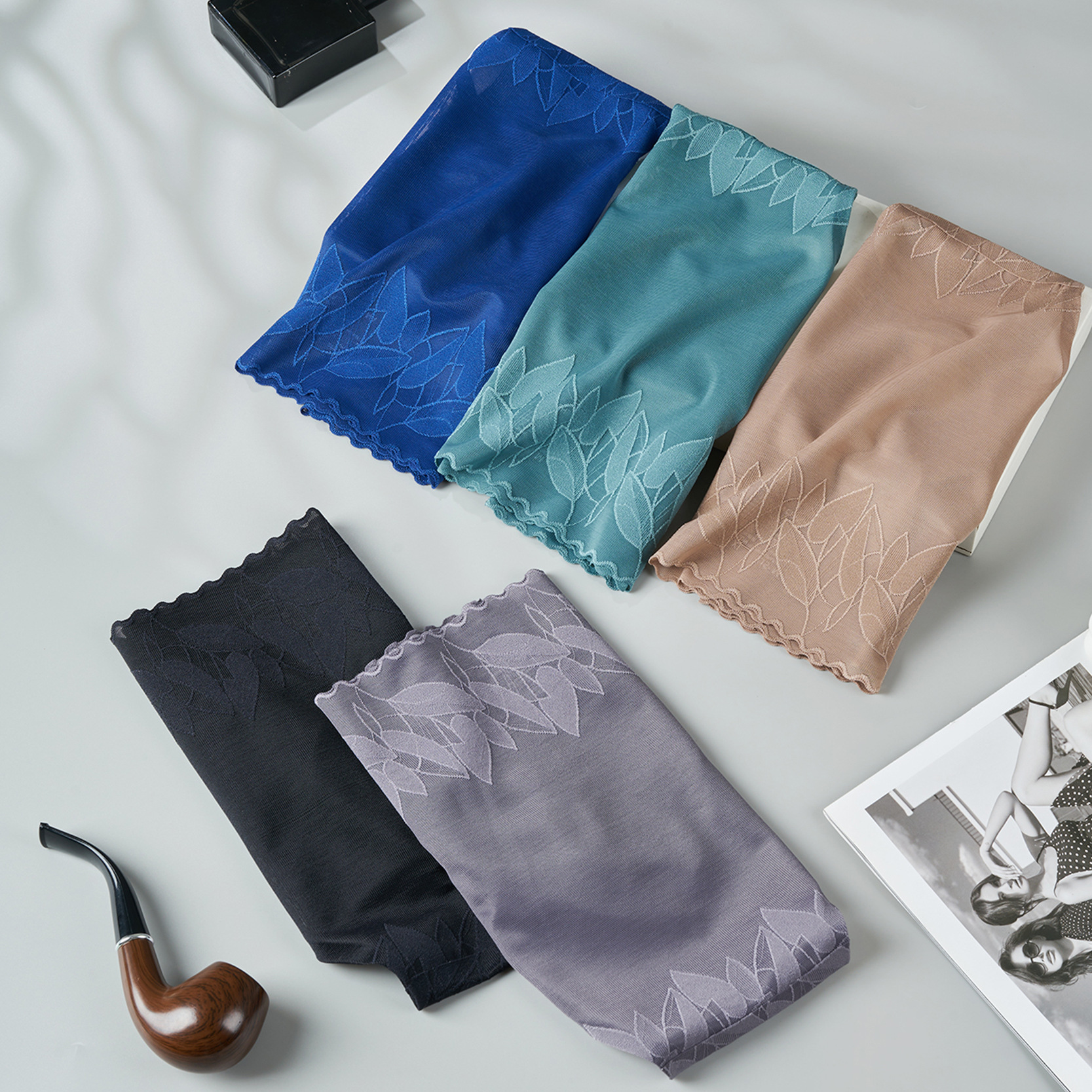 Nuevas calzoncillos de hombre elásticos de encaje 3D bolsas convexas estereoscópicas calzoncillos de hombre sin marcas