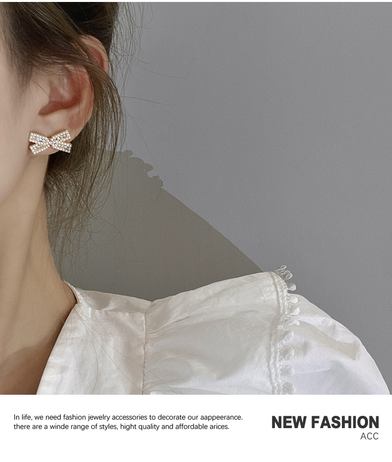 Korean Personality Pearl Earrings Bow Diamond Niche Earrings display picture 8