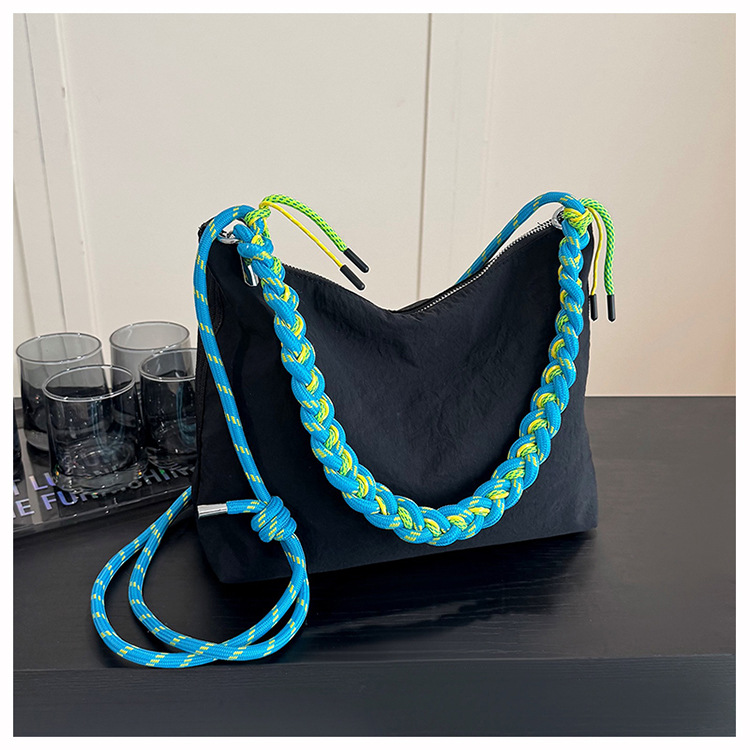 Bolso de tela de nylon de gran capacidad para mujeres 2026 nuevo estilo coreano simple bolso de mochila de nicho de tejido de viaje bolsa