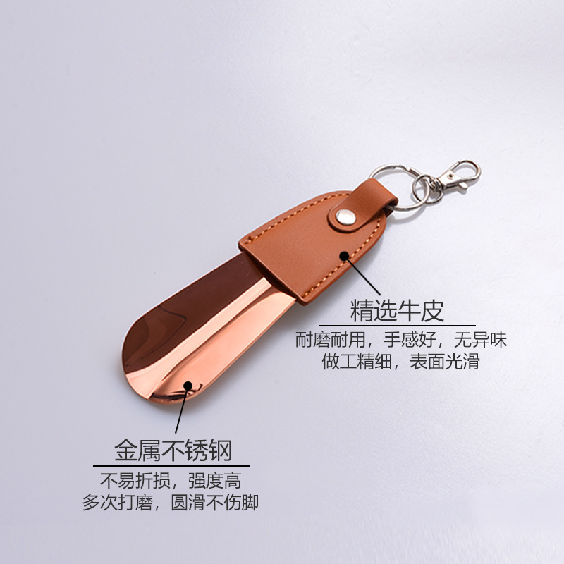Inventario al por mayor de acero inoxidable llaver de zapato de tirador de cuero funda de zapato portátil de tirador de zapato de coche llave colgante elevador de zapato