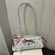 韩版ins蝴蝶结法棍包休闲百搭时尚波点单肩包手提通勤包腋下包女