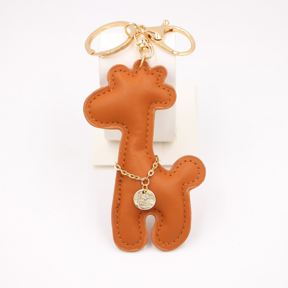 Creative Pu Giraffe Leather Keychain Car Pendant Cartoon Animal Deer Schoolbag Pendant Wholesale display picture 3