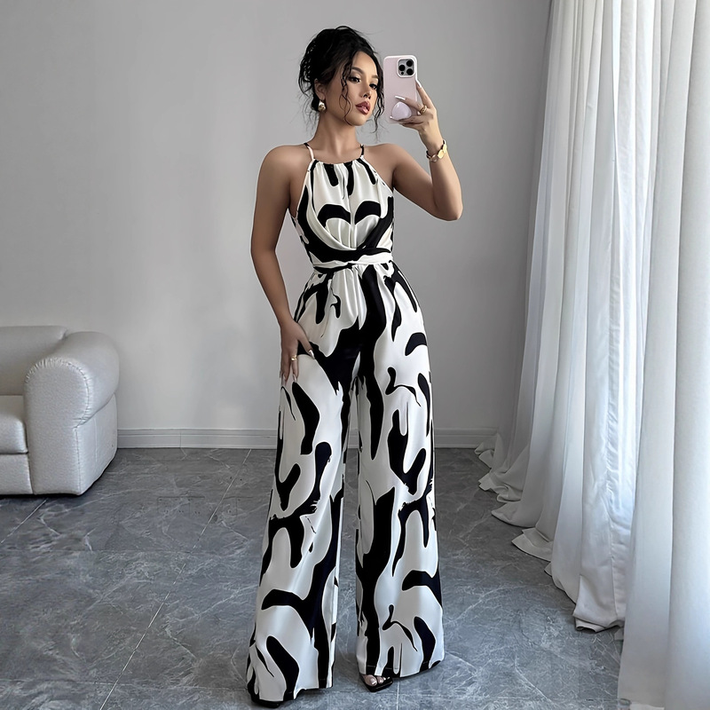 2025 Women's Clothing Wholesale: Slimming Waist, Loose Fit, Black and White Milk Pattern Print Halter Neck Wide-Leg Jumpsuit for Women 2025 Women's Clothing Wholesale: Slimming Waist, Loose Fit, Black and White Milk Pattern Print Halter Neck Wide-Leg Jumpsuit for Women