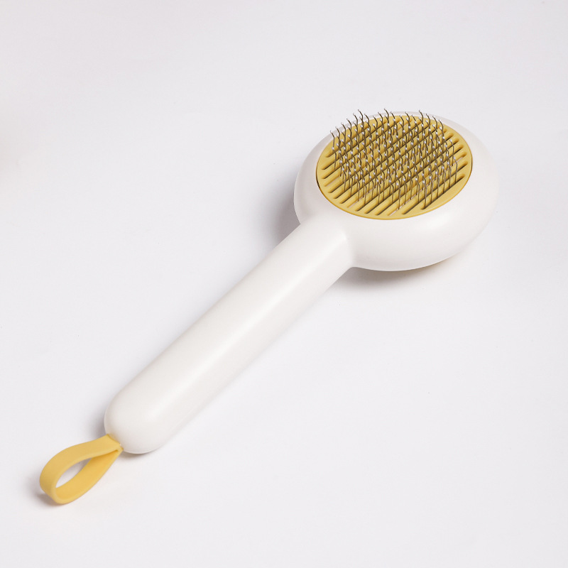 Gato peine pato auto-limpieza peine gato peine cepillo de pelo flotante artefacto mascota peine pelo eliminación mascotas suministros al por mayor