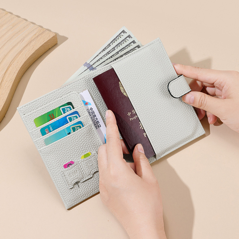 Cross-border damas antirrobo cepillo RFID pasaporte bolsas multifuncionales billete de avión funda de certificados PU cartera general
