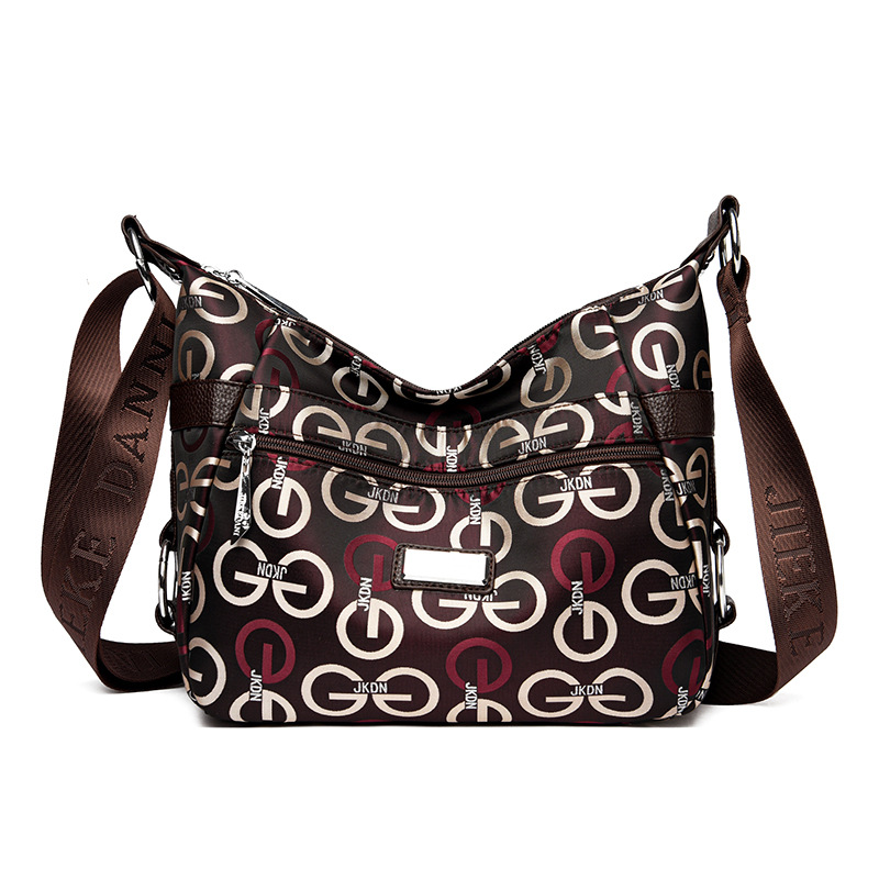 Bolsa de mujer 2023 nueva bolsa de mensajero de hombro de tela Oxford impermeable bolsa de Madre de mujer de mediana edad de gran capacidad multicompartimento