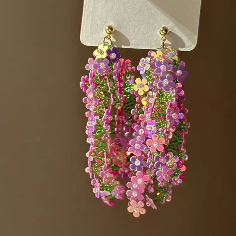 Pendientes de borla de flores de tela de aguja de plata Pendientes de estilo de vacaciones junto al mar