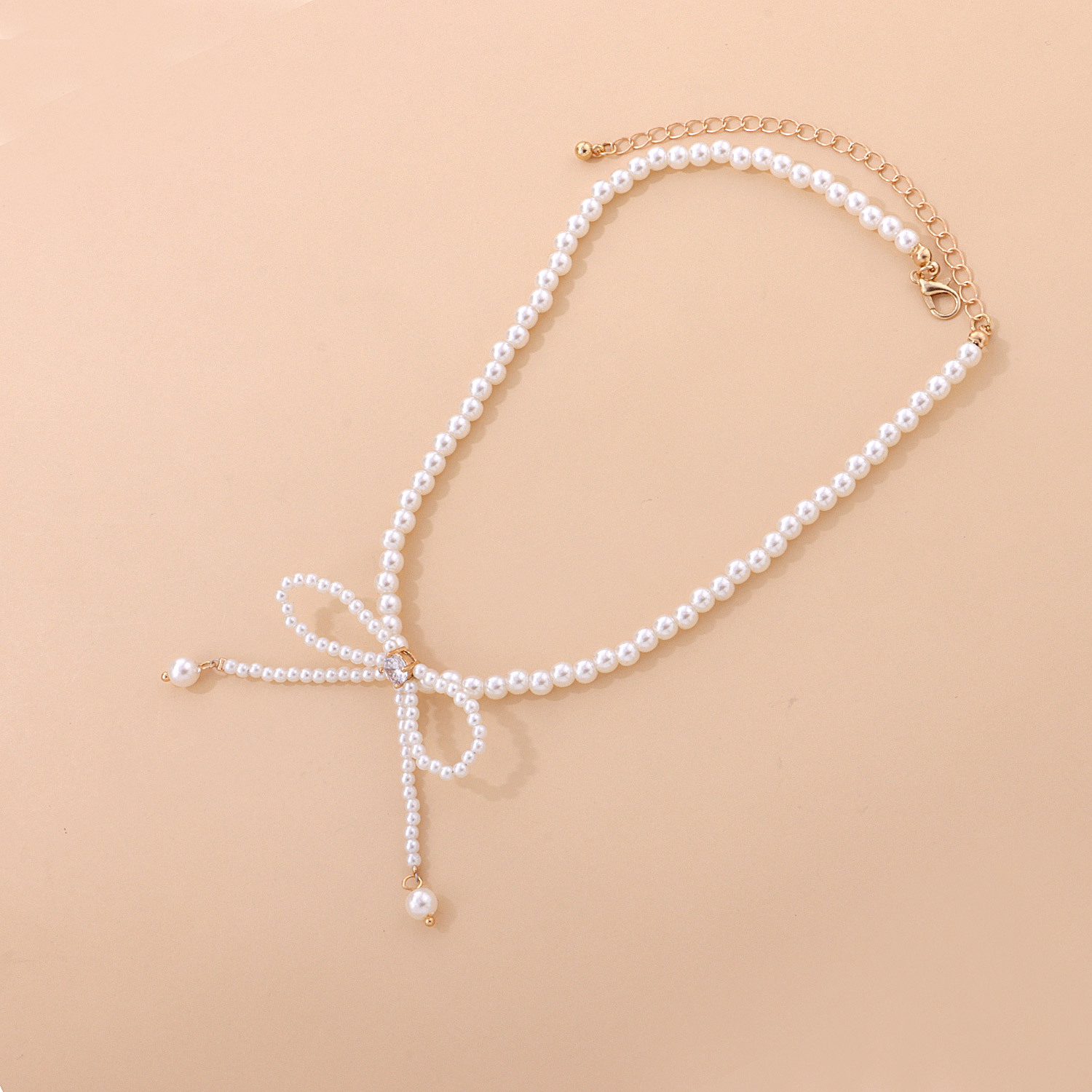 Elegant Sweet Bow Knot Imitation Pearl Alloy Beaded Plating Inlay Rhinestones Women's Necklace display picture 5
