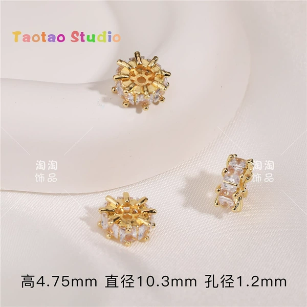 Golden beads with zircon