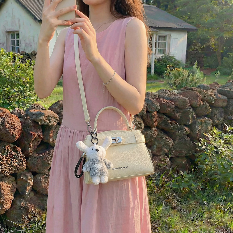 2026 nueva sensación diaria de bolsos portátiles de Kelly, mujeres de moda simple, versátil, lujoso, ligero, de viaje, una sola bolsa de hombro, moda
