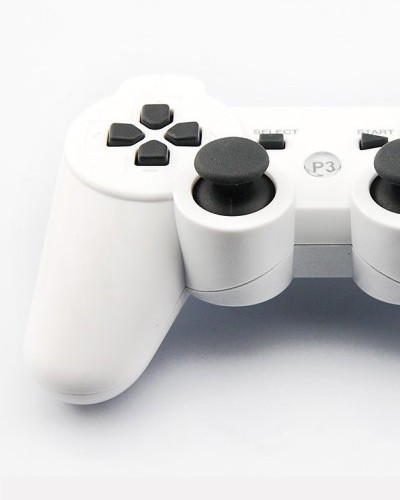 Mando de juego PS3 multicolor con botón universal de copo de nieve de doble vibración Bluetooth inalámbrico con mango P3 transfronterizo de fábrica